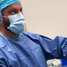 Doctor performing procedure.
